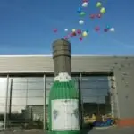 champagnefles met ballonnen